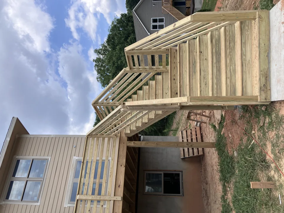 New exterior wood staircase and deck