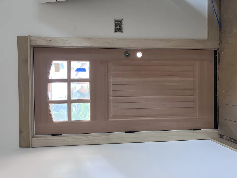 New wood entry door and interior trim