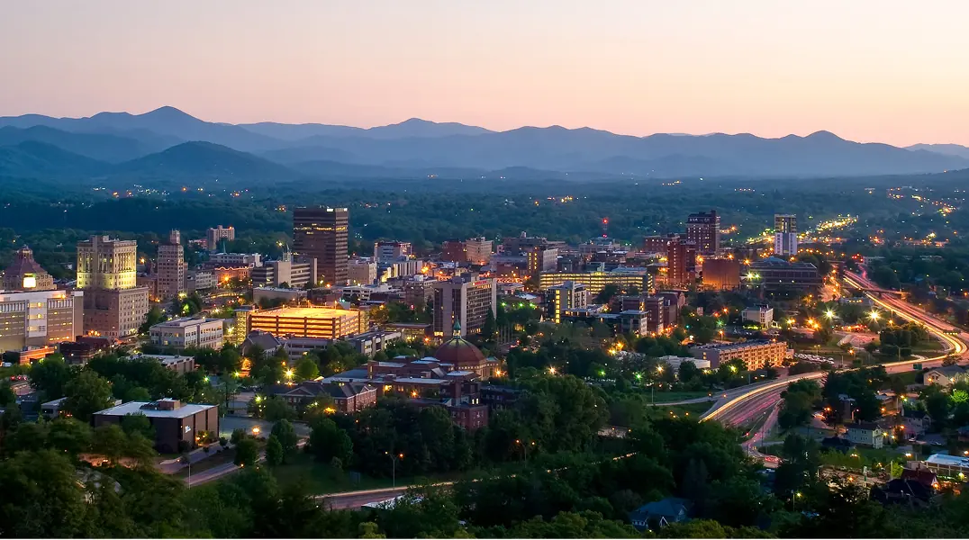 Downtown Asheville with the Blue Ridge Mountains beyond