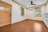 Family room: cork flooring and craftsman entry door