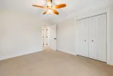 Bedroom with louvered double closet