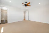 Primary bedroom with walk-in tiled shower ensuite